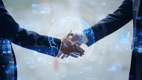 Business partnership handshake